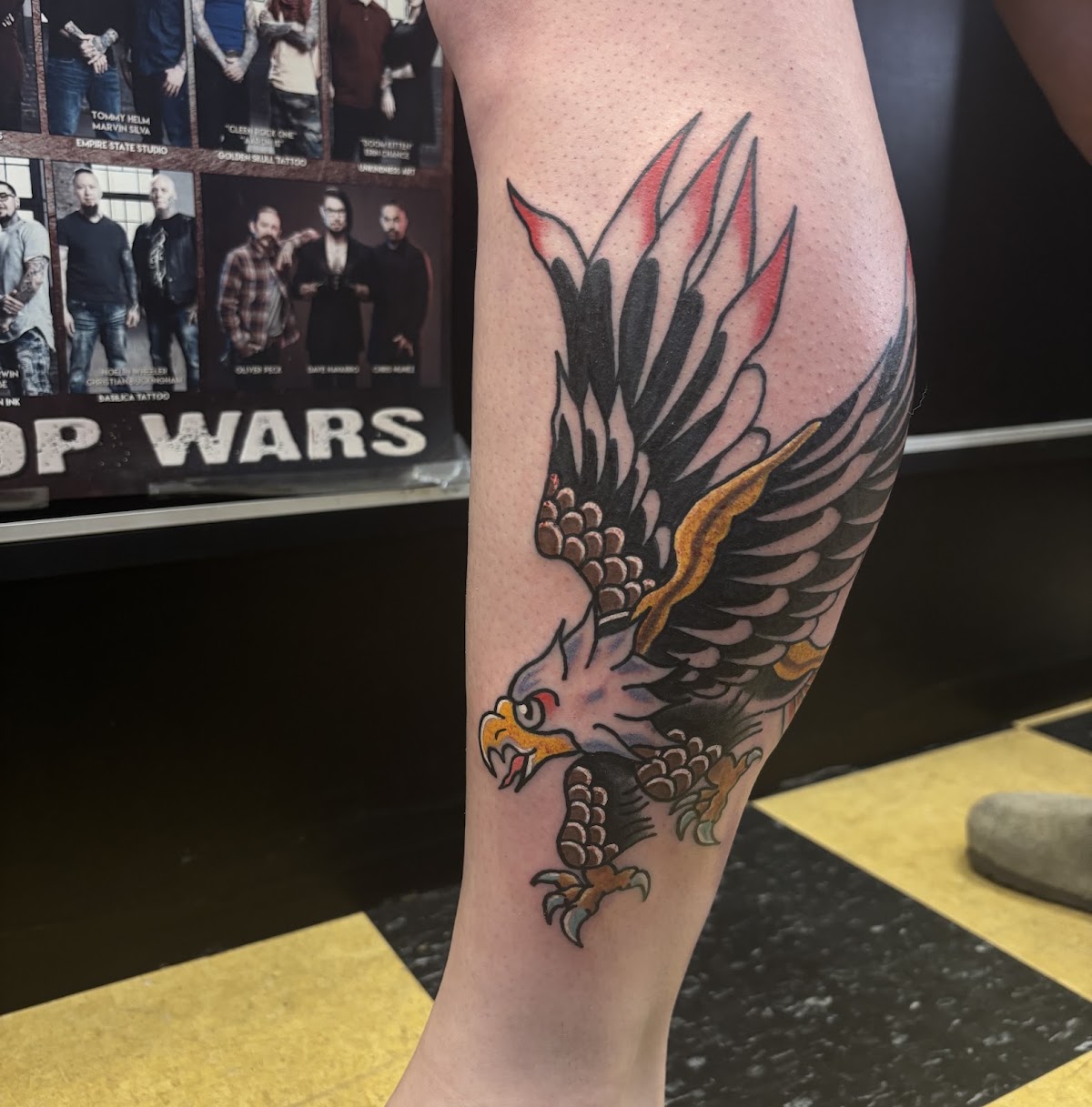Bold traditional eagle tattoo on forearm